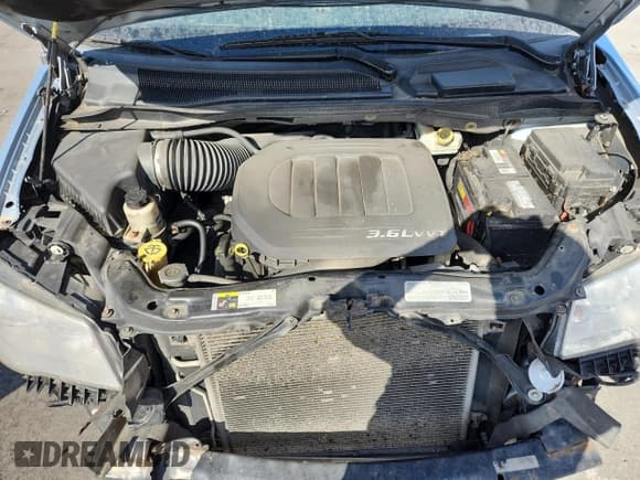 ✅ 2013 Chrysler Town & Country Limited • VIN: 2C4RC1GG9DR589732 • Lot: 70097055. Wystawiony na Copart z przebiegiem 461 098 mil. Bezpłatny archiwum sprzedaży aukcyjnych z USA i szczegółowy raport historii pojazdu na DreamBid. Zdjęcie 12.