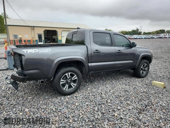 ✅ 2018 Toyota Tacoma TRD Off Road • VIN: 3TMCZ5AN3JM146093 • Лот: 85602295. Опубликован ранее на Copart с пробегом 157 984 миль. Бесплатный доступ к архиву аукционных продаж из США и подробный отчёт об истории автомобиля на DreamBid. Изображение 3.