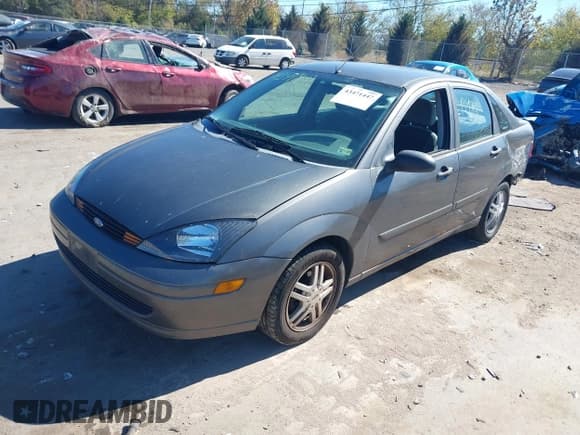 ✅ 2003 Ford Focus SE • VIN: 1FAFP34313W293846 • Лот: 43471447. Опубликован ранее на IAAI с пробегом 128 750 миль. Бесплатный доступ к архиву аукционных продаж из США и подробный отчёт об истории автомобиля на DreamBid. Изображение 17.