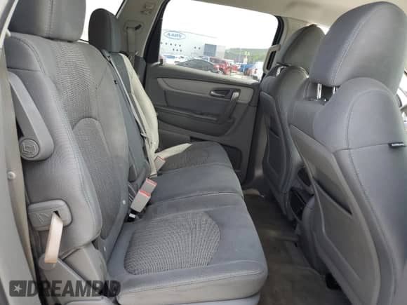 2017 Chevrolet Traverse LS z VIN 1GNKRFED0HJ215632, wystawiony jako Copart lot #69195905 z przebiegiem 188 011 mil mil oraz Szkoda całkowita • Salvage title. Historia ofert i sprzedaży dostępna na DreamBid. Obrazek 11.