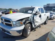 ✅ 2021 Ram 1500 Tradesman • VIN: 3C6RR6KT9MG663776 • Lot: 43423004. Listed on IAAI with 27,801 mi. Free auction sales archive from the USA and detailed vehicle history report at DreamBid. Image 2.