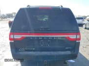 ✅ 2015 Lincoln Navigator • VIN: 5LMJJ3JT3FEJ00335 • Lot: 41585554. Listed on IAAI with 163,841 mi. Free auction sales archive from the USA and detailed vehicle history report at DreamBid. Image 16.
