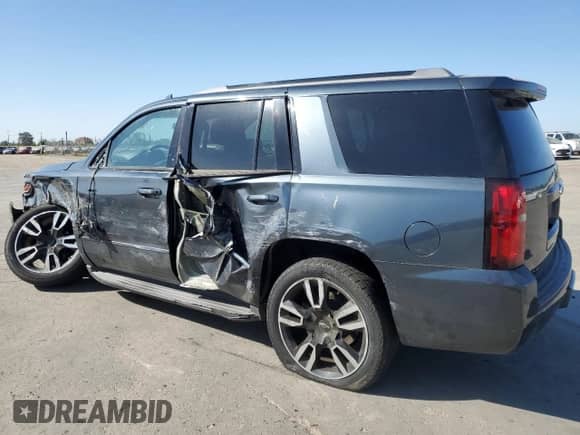 2019 Chevrolet Tahoe Premier z VIN 1GNSKCKJ9KR200083, wystawiony jako Copart lot #57910955 z przebiegiem 53 126 mil mil oraz Szkoda całkowita • Salvage title. Historia ofert i sprzedaży dostępna na DreamBid. Obrazek 2.
