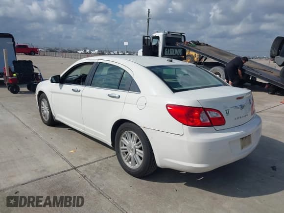 ✅ 2008 Chrysler Sebring • VIN: 1C3LC66J68N284521 • Lot: 41508199. Listed on IAAI with 217,216 mi. Free auction sales archive from the USA and detailed vehicle history report at DreamBid. Image 3.