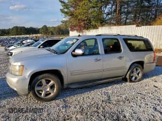 ✅ 2011 Chevrolet Suburban LS • VIN: 1GNSCHE09BR265951 • Lot: 93891265. Listed on Copart with 209,312 mi. Free auction sales archive from the USA and detailed vehicle history report at DreamBid. Image 1.