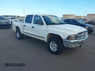 ✅ 2002 Dodge Dakota SLT • VIN: 1B7HG48Z82S517093 • Lot: 43199632. Listed on IAAI with 175,532 mi. Free auction sales archive from the USA and detailed vehicle history report at DreamBid. Image 1.