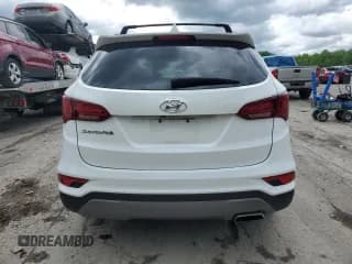 ✅ 2018 Hyundai Santa Fe 2.4L • VIN: 5XYZU3LB0JG535142 • Лот: 54586104. Опубликован ранее на Copart с пробегом 58 661 миль. Бесплатный доступ к архиву аукционных продаж из США и подробный отчёт об истории автомобиля на DreamBid. Изображение 6.