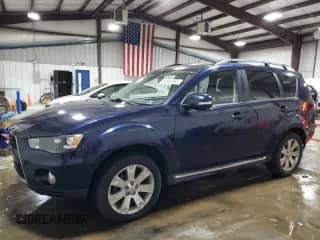 2013 Mitsubishi Outlander SE with VIN JA4JT3AW6DU013733, listed as a Copart auction lot 90352365 with 143,222 mi miles and Clean title. Bid and sale history available at DreamBid. Image 1.