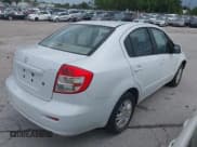 ✅ 2013 Suzuki SX4 LE • VIN: JS2YC5A31D6101654 • Lot: 42970256. Wystawiony na IAAI z przebiegiem 142 596 mil. Bezpłatny archiwum sprzedaży aukcyjnych z USA i szczegółowy raport historii pojazdu na DreamBid. Zdjęcie 4.