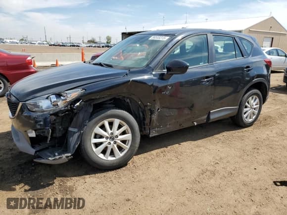 ✅ 2014 Mazda CX-5 Sport • VIN: JM3KE2BE0E0335126 • Lot: 56555315. Listed on Copart with 116,718 mi. Free auction sales archive from the USA and detailed vehicle history report at DreamBid. Image 1.