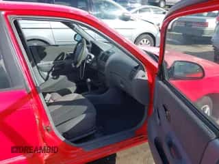 2001 Hyundai Accent GL z VIN KMHCG45C81U244150, wystawiony jako IAAI lot #43452969 z przebiegiem 116 250 mil mil oraz . Historia ofert i sprzedaży dostępna na DreamBid. Obrazek 5.