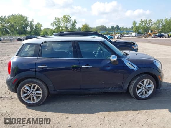 ✅ 2014 MINI Countryman • VIN: WMWZB3C55EWR39737 • Lot: 42964502. Listed on IAAI with 112,473 mi. Free auction sales archive from the USA and detailed vehicle history report at DreamBid. Image 13.