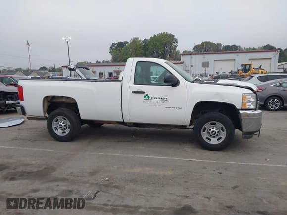 ✅ 2012 Chevrolet Silverado 2500HD Work Truck • VIN: 1GB0CVCG8CF145676 • Lot: 41835188. Wystawiony na IAAI z przebiegiem 88 412 mil. Bezpłatny archiwum sprzedaży aukcyjnych z USA i szczegółowy raport historii pojazdu na DreamBid. Zdjęcie 13.