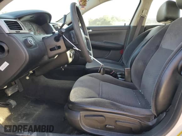 2014 Chevrolet Impala Police Police with VIN 2G1WD5E39E1109754, listed as a Copart auction lot 74425204 with 171,171 mi miles and Salvage title. Bid and sale history available at DreamBid. Image 7.