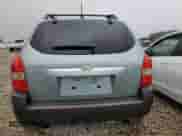 2005 Hyundai Tucson GLS z VIN KM8JN72DX5U214908, wystawiony jako Copart lot #76346024 z przebiegiem 152 677 mil mil oraz Szkoda całkowita • Salvage title. Historia ofert i sprzedaży dostępna na DreamBid. Obrazek 6.