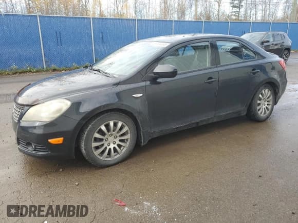 ✅ 2012 Suzuki Kizashi SE • VIN: JS2RF9A32C6100580 • Лот: 91204895. Опубликован ранее на Copart с пробегом 173 714 миль. Бесплатный доступ к архиву аукционных продаж из США и подробный отчёт об истории автомобиля на DreamBid. Изображение 1.