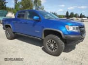 ✅ 2020 Chevrolet Colorado 4WD ZR2 • VIN: 1GCPTEE19L1176032 • Lot: 56003155. Listed on Copart with 44,548 mi. Free auction sales archive from the USA and detailed vehicle history report at DreamBid. Image 4.