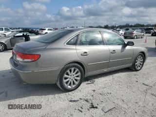 2009 Hyundai Azera Limited с VIN KMHFC46FX9A373084, выставлен на аукционе Copart как лот 45532865 с пробегом 107 592 миль миль и Списание • Salvage title. История ставок и продаж доступна на DreamBid. Изображение 3.