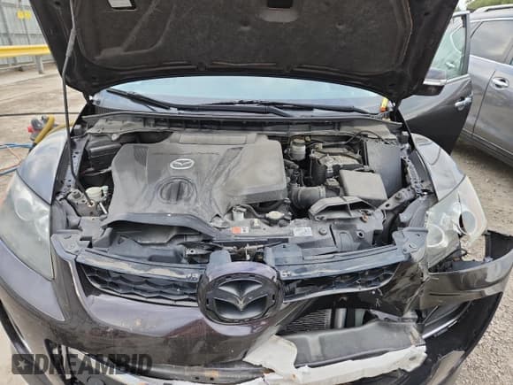 ✅ 2010 Mazda CX-7 Touring • VIN: JM3ER2W36A0347981 • Lot: 70999775. Listed on Copart with 102,853 mi. Free auction sales archive from the USA and detailed vehicle history report at DreamBid. Image 12.