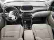 2021 Hyundai Tucson Value with VIN KM8J3CA41MU328214, listed as a Copart auction lot 83759975 with 61,891 mi miles and Salvage title. Bid and sale history available at DreamBid. Image 8.