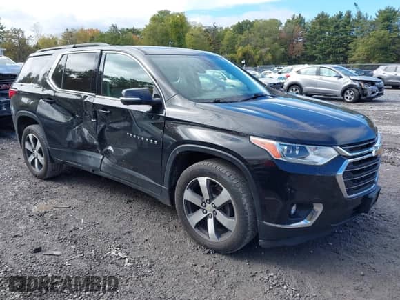 2020 Chevrolet Traverse LT z VIN 1GNEVHKW3LJ106407, wystawiony jako IAAI lot #43463464 z przebiegiem 103 973 mil mil oraz . Historia ofert i sprzedaży dostępna na DreamBid. Obrazek 1.