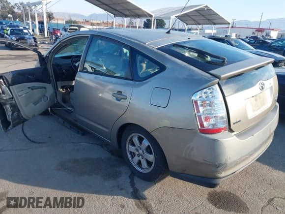 ✅ 2006 Toyota Prius • VIN: JTDKB20U863141777 • Lot: 41427842. Wystawiony na IAAI z przebiegiem 159 387 mil. Bezpłatny archiwum sprzedaży aukcyjnych z USA i szczegółowy raport historii pojazdu na DreamBid. Zdjęcie 3.