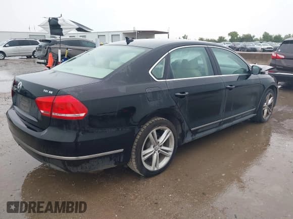 ✅ 2014 Volkswagen Passat SE • VIN: 1VWBN7A3XEC088988 • Лот: 43028539. Опубликован ранее на IAAI с пробегом 114 764 миль. Бесплатный доступ к архиву аукционных продаж из США и подробный отчёт об истории автомобиля на DreamBid. Изображение 4.