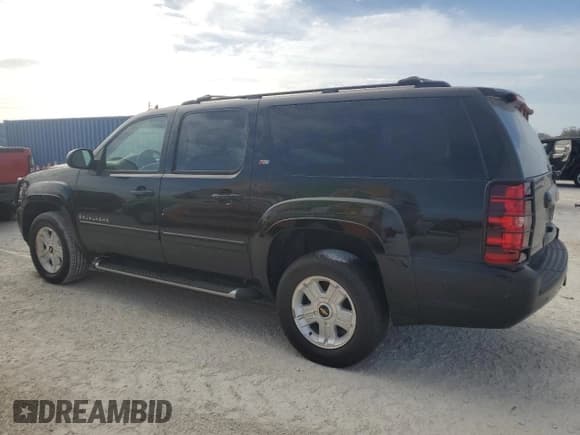 ✅ 2009 Chevrolet Suburban 1LT • VIN: 1GNFK26349R215270 • Lot: 76566284. Wystawiony na Copart z przebiegiem Nie podano. Bezpłatny archiwum sprzedaży aukcyjnych z USA i szczegółowy raport historii pojazdu na DreamBid. Zdjęcie 2.