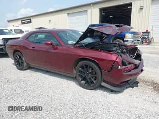 2020 Dodge Challenger SXT z VIN 2C3CDZAG5LH226556, wystawiony jako IAAI lot #43154137 z przebiegiem 91 789 mil mil oraz . Historia ofert i sprzedaży dostępna na DreamBid. Obrazek 1.