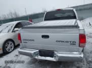 ✅ 2004 Dodge Dakota SLT • VIN: 1D7HG48N34S665027 • Lot: 41395509. Wystawiony na IAAI z przebiegiem 128 064 mil. Bezpłatny archiwum sprzedaży aukcyjnych z USA i szczegółowy raport historii pojazdu na DreamBid. Zdjęcie 16.