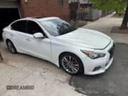✅ 2014 Infiniti Q50 Sport • VIN: JN1BV7AP7EM689505 • Lot: 42172352. Listed on IAAI with 133,824 mi. Free auction sales archive from the USA and detailed vehicle history report at DreamBid. Image 1.