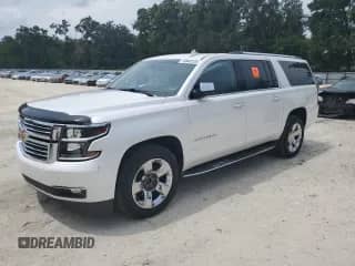 2016 Chevrolet Suburban LTZ z VIN 1GNSKJKCXGR207606, wystawiony jako Copart lot #70943125 z przebiegiem 169 007 mil mil oraz Szkoda całkowita • Salvage title. Historia ofert i sprzedaży dostępna na DreamBid. Obrazek 1.