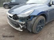 ✅ 2023 Tesla Model Y Long Range • VIN: 7SAYGDEE1PF672240 • Lot: 43619274. Listed on IAAI with 32,916 mi. Free auction sales archive from the USA and detailed vehicle history report at DreamBid. Image 21.