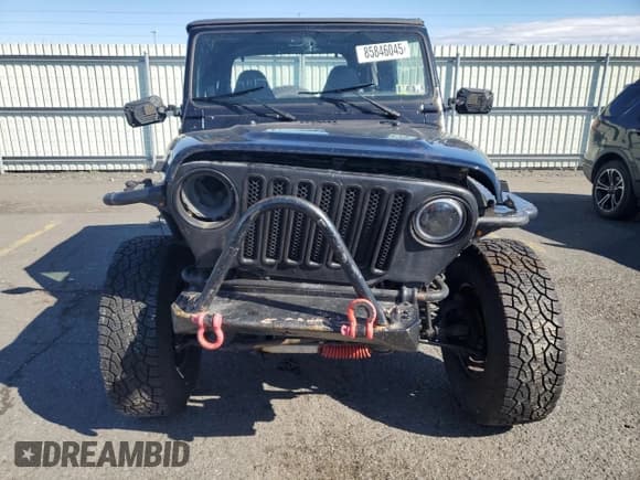 ✅ 1998 Jeep Wrangler Sport • VIN: 1J4FY19S1WP705803 • Lot: 85846045. Listed on Copart with 169,658 mi. Free auction sales archive from the USA and detailed vehicle history report at DreamBid. Image 5.