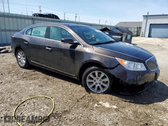 ✅ 2013 Buick LaCrosse Leather • VIN: 1G4GC5ERXDF201509 • Lot: 54270045. Listed on Copart with 136,859 mi. Free auction sales archive from the USA and detailed vehicle history report at DreamBid. Image 4.