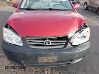 ✅ 2003 Toyota Corolla LE • VIN: 1NXBR32E03Z164074 • Lot: 43528734. Listed on IAAI with 242,551 mi. Free auction sales archive from the USA and detailed vehicle history report at DreamBid. Image 6.