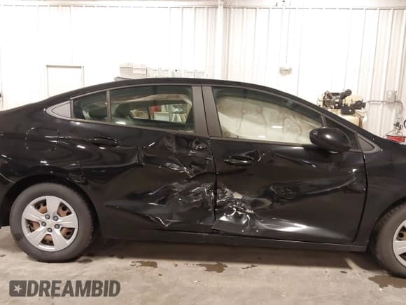 ✅ 2018 Chevrolet Cruze LS • VIN: 1G1BB5SM7J7131573 • Lot: 43507247. Listed on IAAI with 59,735 mi. Free auction sales archive from the USA and detailed vehicle history report at DreamBid. Image 6.