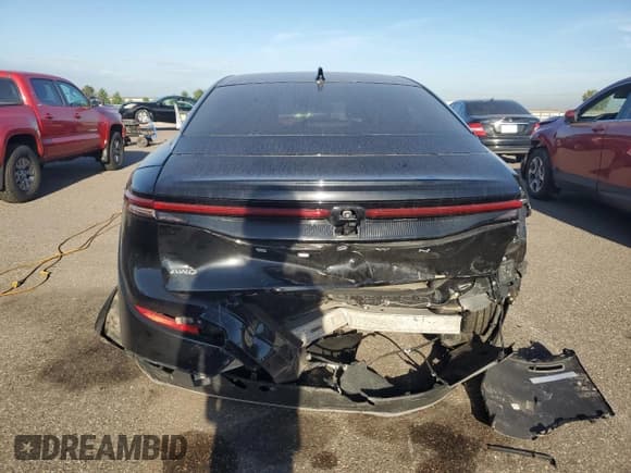 ✅ 2023 Toyota Crown XLE • VIN: JTDAAAAF3P3008306 • Lot: 82002525. Listed on Copart with 133,015 mi. Free auction sales archive from the USA and detailed vehicle history report at DreamBid. Image 6.