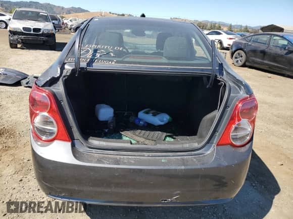 2013 Chevrolet Sonic LT с VIN 1G1JC5SB7D4142876, выставлен на аукционе Copart как лот 71410664 с пробегом Не указан миль и Списание • Salvage title. История ставок и продаж доступна на DreamBid. Изображение 6.