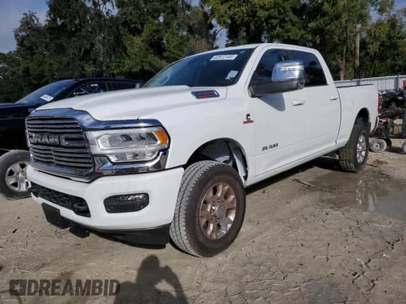 ✅ 2024 Ram 2500 Laramie • VIN: 3C6UR5FL0RG355174 • Lot: 82612145. Listed on Copart with 22,099 mi. Free auction sales archive from the USA and detailed vehicle history report at DreamBid. Image 1.