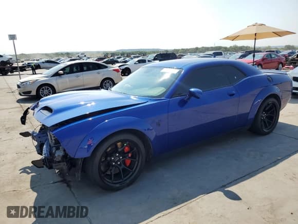 ✅ 2022 Dodge Challenger SRT Hellcat Redeye Widebody • VIN: 2C3CDZL91NH107887 • Lot: 65779774. Wystawiony na Copart z przebiegiem 29 985 mil. Bezpłatny archiwum sprzedaży aukcyjnych z USA i szczegółowy raport historii pojazdu na DreamBid. Zdjęcie 1.