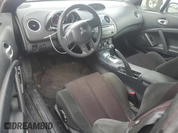 ✅ 2012 Mitsubishi Eclipse GS Sport • VIN: 4A37L2EF2CE003808 • Lot: 63674575. Wystawiony na Copart z przebiegiem 87 385 mil. Bezpłatny archiwum sprzedaży aukcyjnych z USA i szczegółowy raport historii pojazdu na DreamBid. Zdjęcie 8.