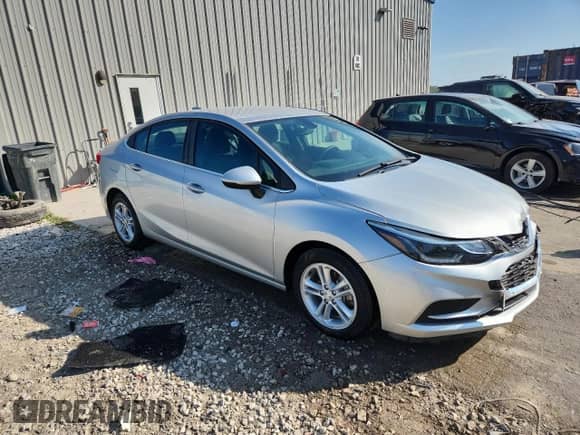 ✅ 2018 Chevrolet Cruze LT • VIN: 1G1BE5SM0J7217640 • Лот: 82124305. Опубликован ранее на Copart с пробегом 20 864 миль. Бесплатный доступ к архиву аукционных продаж из США и подробный отчёт об истории автомобиля на DreamBid. Изображение 4.