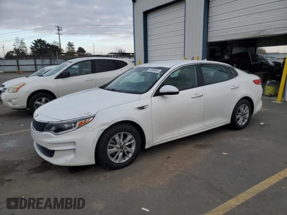 ✅ 2016 Kia Optima LX • VIN: KNAGT4L35G5072079 • Лот: 93869485. Опубликован ранее на Copart с пробегом 66 624 миль. Бесплатный доступ к архиву аукционных продаж из США и подробный отчёт об истории автомобиля на DreamBid. Изображение 1.