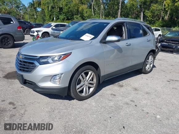 ✅ 2020 Chevrolet Equinox Premier • VIN: 2GNAXYEX1L6200828 • Лот: 43685798. Опубликован ранее на IAAI с пробегом 112 032 миль. Бесплатный доступ к архиву аукционных продаж из США и подробный отчёт об истории автомобиля на DreamBid. Изображение 2.