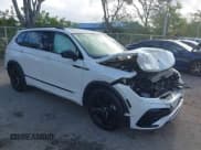 ✅ 2023 Volkswagen Tiguan SE R-Line Black • VIN: 3VVCB7AX0PM092375 • Lot: 42176568. Listed on IAAI with 25,037 mi. Free auction sales archive from the USA and detailed vehicle history report at DreamBid. Image 1.