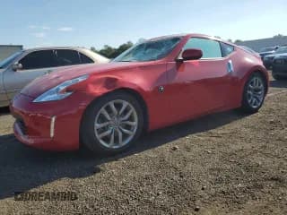 ✅ 2015 Nissan 370Z • VIN: JN1AZ4EH4FM442784 • Lot: 70318715. Listed on Copart with 122,880 mi. Free auction sales archive from the USA and detailed vehicle history report at DreamBid. Image 1.