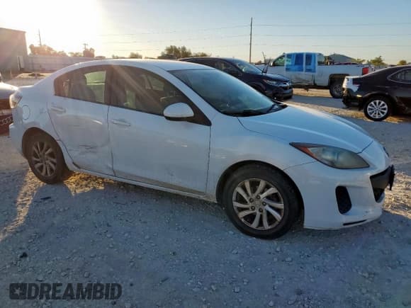 ✅ 2012 Mazda 3 i Touring • VIN: JM1BL1V71C1570311 • Lot: 90266115. Wystawiony na Copart z przebiegiem 187 268 mil. Bezpłatny archiwum sprzedaży aukcyjnych z USA i szczegółowy raport historii pojazdu na DreamBid. Zdjęcie 4.