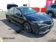 2022 Toyota Camry SE with VIN 4T1G11BK1NU050000, listed as a IAAI auction lot 42348766 with 57,429 mi miles and . Bid and sale history available at DreamBid. Image 1.