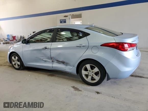 ✅ 2013 Hyundai Elantra GLS • VIN: KMHDH4AE8DU626319 • Lot: 91500215. Listed on Copart with 132,569 mi. Free auction sales archive from the USA and detailed vehicle history report at DreamBid. Image 2.